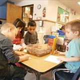 Meyers Road KinderCare Photo #7 - Our prekindergarten class concentrating hard on their journals.
