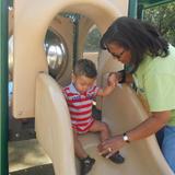 West Carol Stream KinderCare Photo #7 - Ms. Trudy enjoys assisting the toddlers as they define their large motor skills.
